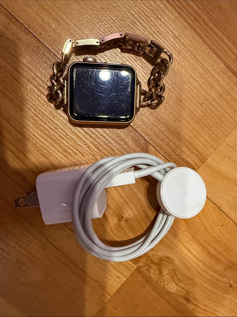 Apple Gold Smartwatch with Chain Link Bracelet band and White Charger Series 3